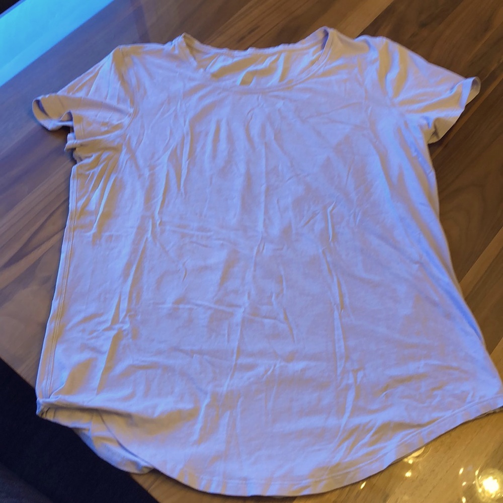 Light purple Lulu love crew tee shirt. Lightly used in great condition. No tags